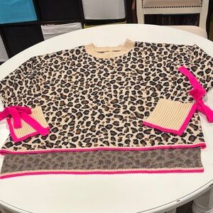 Crown & Ivy Cheetah Print Bow Crewneck Sweater.